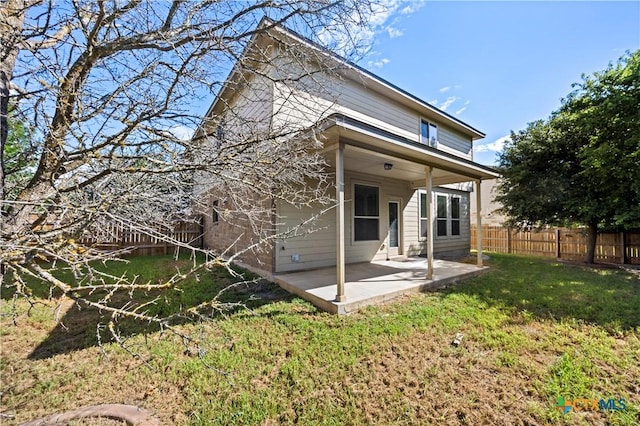 703 Curtis Dr, Killeen, TX 76542 - rear view of property featuring a patio area and a fenced backyard