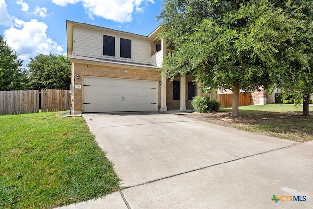 703 Curtis Dr, Killeen, TX 76542 - view of front facade featuring a garage and concrete driveway