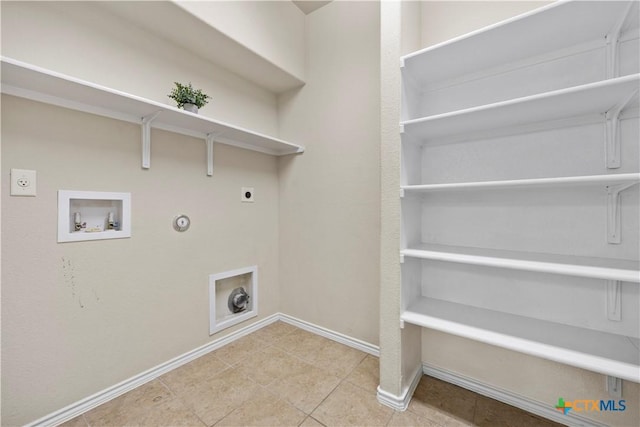 703 Curtis Dr, Killeen, TX 76542 - laundry area with hookup for an electric dryer, gas dryer hookup, hookup for a washing machine, and light tile patterned flooring
