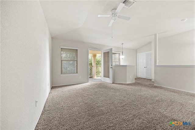 703 Curtis Dr, Killeen, TX 76542 - unfurnished living room featuring vaulted ceiling, carpet floors, and a ceiling fan