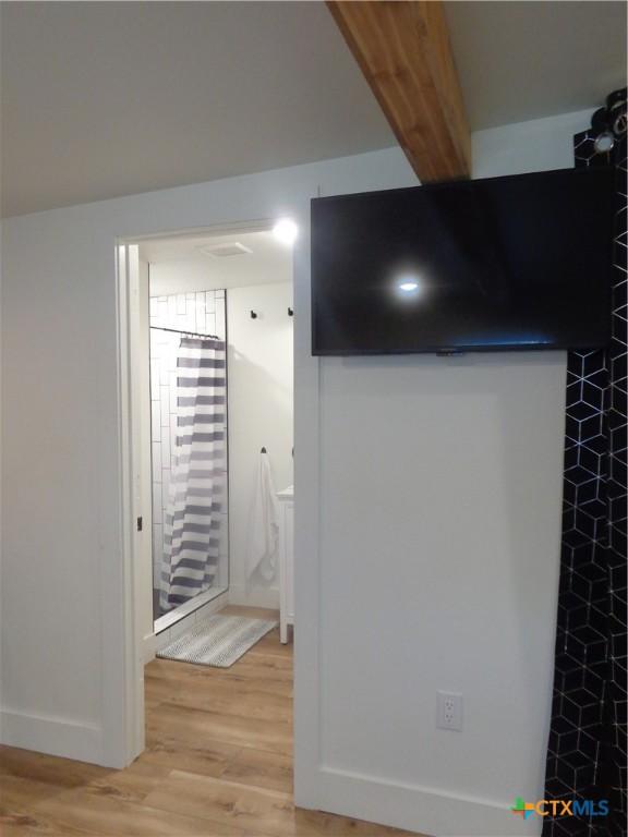 1009 Edgewater Fls, Canyon Lake, TX 78133 - detailed view of wood finished floors and baseboards