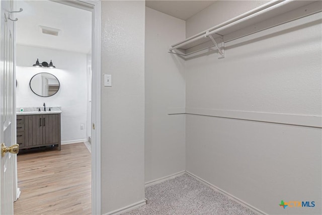 spacious closet with visible vents