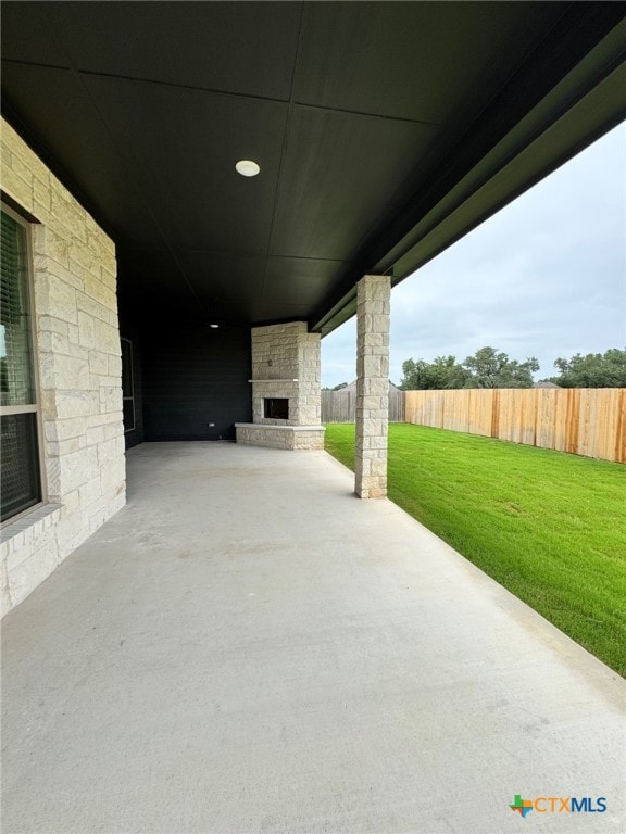 10826 Campsite Cv, Temple, TX 76502 - view of patio / terrace featuring an outdoor stone fireplace
