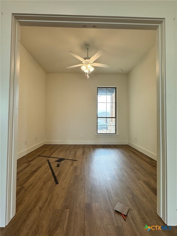10826 Campsite Cv, Temple, TX 76502 - unfurnished room with a ceiling fan, wood finished floors, and baseboards