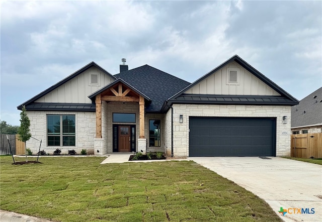 10826 Campsite Cv, Temple, TX 76502 - view of front facade featuring an attached garage, board and batten siding, driveway, and fence