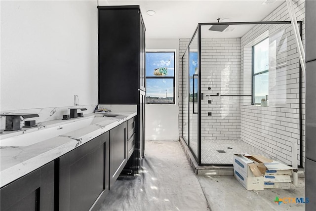 bathroom with walk in shower, concrete flooring, and vanity