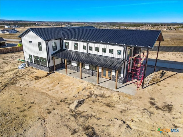 rear view of house featuring a patio area