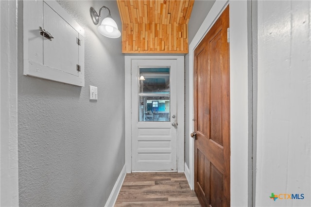 doorway featuring hardwood / wood-style floors