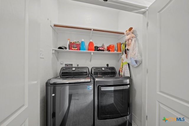 laundry area featuring separate washer and dryer