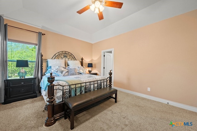bedroom with carpet, baseboards, and a ceiling fan