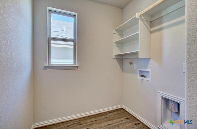 washroom featuring washer hookup and hardwood / wood-style flooring