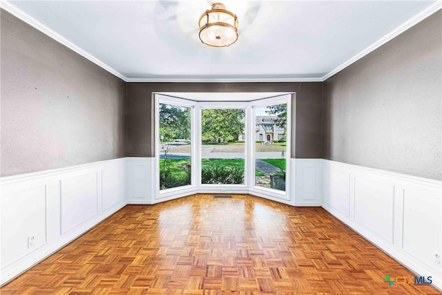 3426 Austin Ave, Waco, TX 76710 - spare room with ornamental molding, a wainscoted wall, and a decorative wall