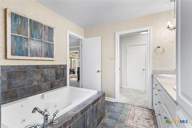 3426 Austin Ave, Waco, TX 76710 - full bathroom with a whirlpool tub, vanity, and a chandelier
