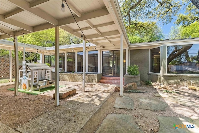 3426 Austin Ave, Waco, TX 76710 - view of patio / terrace featuring a sunroom and entry steps