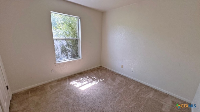 view of carpeted spare room