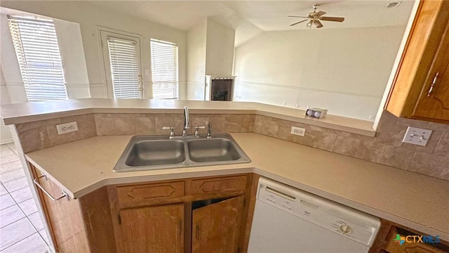 1302 Creek St, Copperas Cove, TX 76522 - kitchen featuring dishwasher, light countertops, a ceiling fan, light tile patterned flooring, and vaulted ceiling