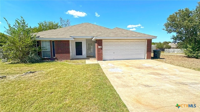 single story home with a garage and a front yard