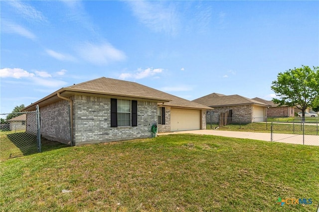 single story home featuring an attached garage, a front yard, concrete driveway, and fence