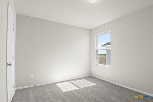 128 Bluestem Dr, Elgin, TX 78621 - unfurnished room featuring carpet and baseboards