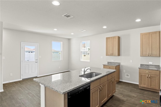 128 Bluestem Dr, Elgin, TX 78621 - kitchen featuring black dishwasher, a sink, dark wood-type flooring, light stone countertops, and recessed lighting