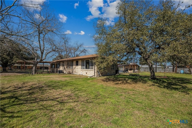 view of yard with fence