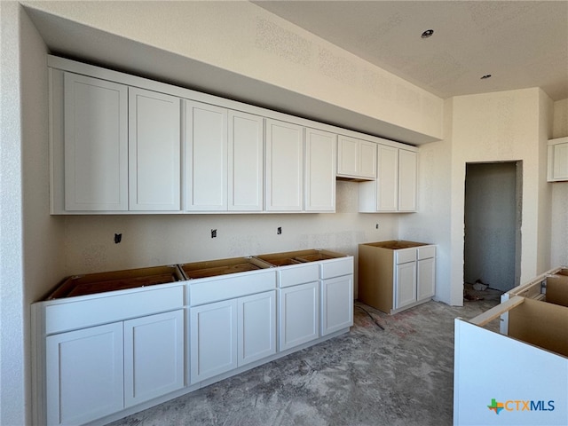 kitchen with white cabinets