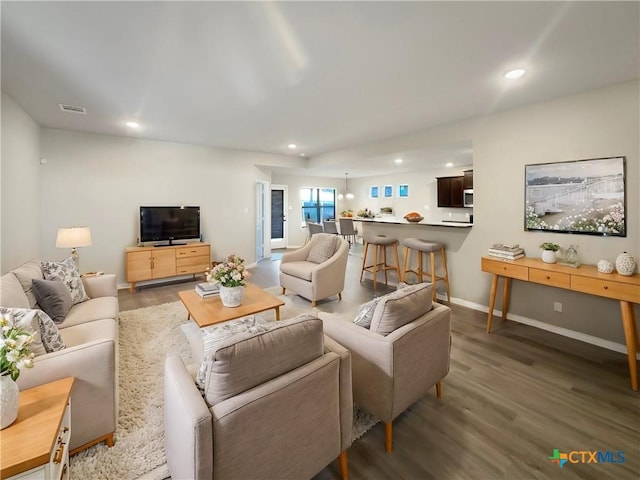 living room with wood-type flooring