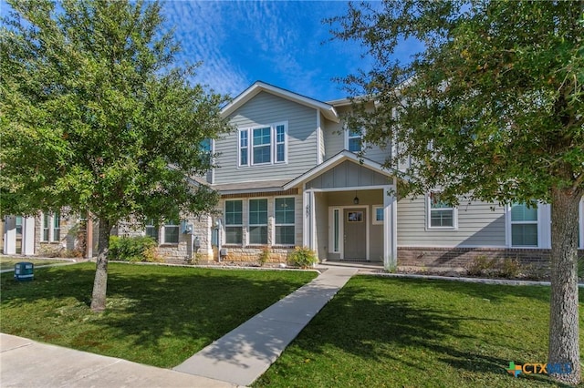 view of front of house featuring a front lawn