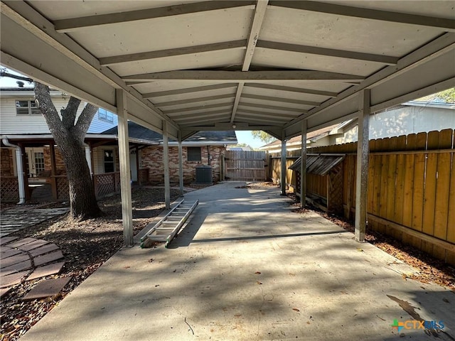 view of patio with a carport and central AC unit