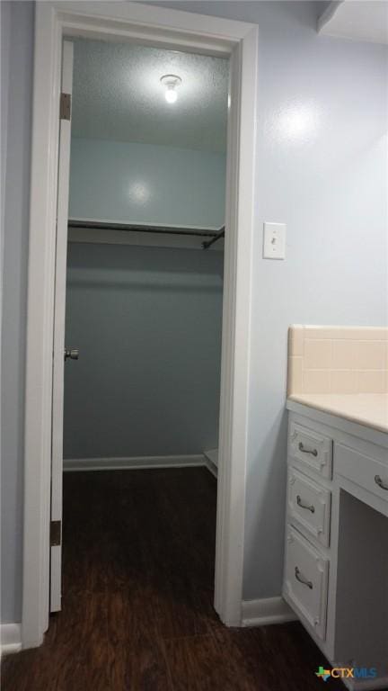 bathroom with hardwood / wood-style floors and vanity