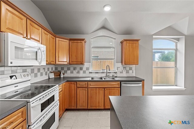 4504 Twin Oaks Cir, Killeen, TX 76542 - bathroom with a stall shower, vanity, tile patterned floors, and plenty of natural light