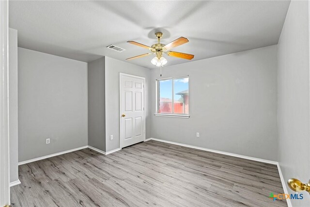 4504 Twin Oaks Cir, Killeen, TX 76542 - empty room featuring ceiling fan and wood finished floors