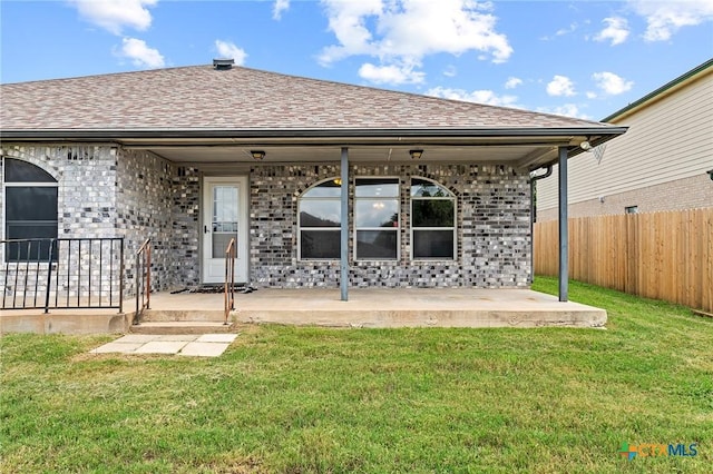 4504 Twin Oaks Cir, Killeen, TX 76542 - rear view of property with brick siding and roof with shingles