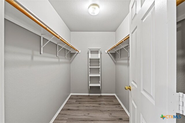 4504 Twin Oaks Cir, Killeen, TX 76542 - spacious closet with wood finished floors