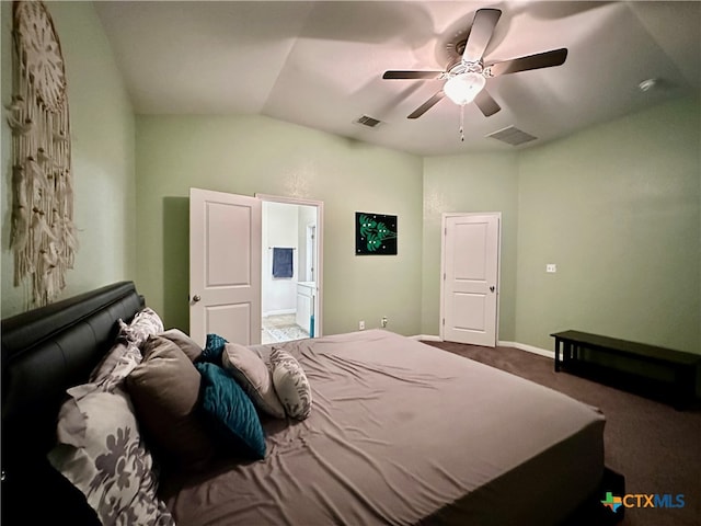 bedroom with ensuite bath, lofted ceiling, ceiling fan, and carpet floors