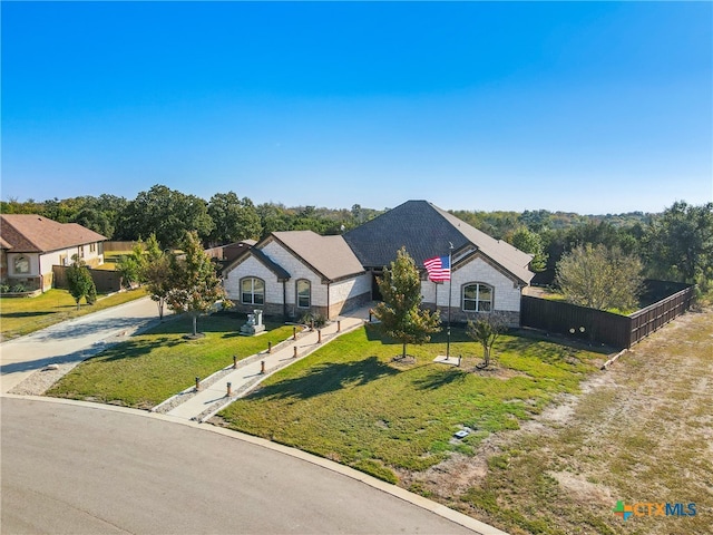 view of front of house with a front lawn