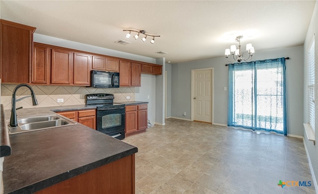 kitchen with black appliances, sink, tasteful backsplash, a notable chandelier, and pendant lighting