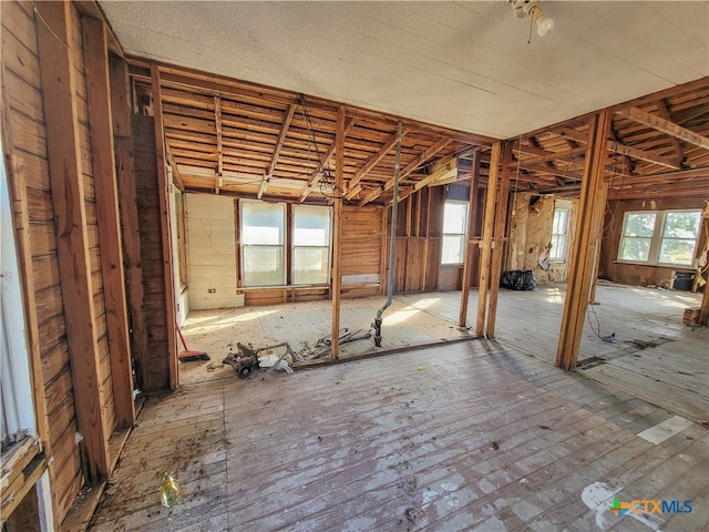 misc room featuring a wealth of natural light and vaulted ceiling