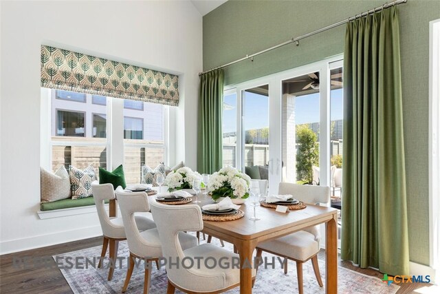 225 Dycus Bnd, Liberty Hill, TX 78642 - dining room with wood finished floors and baseboards