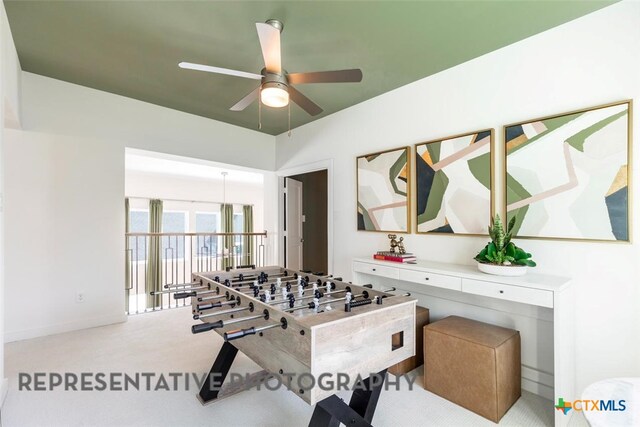 225 Dycus Bnd, Liberty Hill, TX 78642 - playroom with ceiling fan, carpet flooring, and baseboards