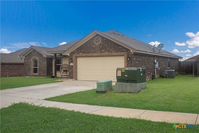 single story home with a garage, cooling unit, and a front lawn