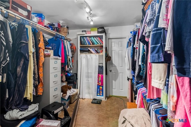 spacious closet with tile patterned flooring