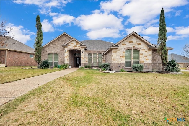 view of front of property with a front lawn