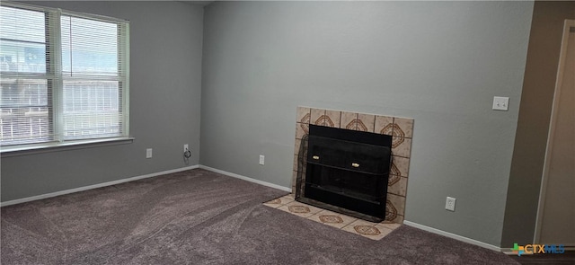 1805 Dickens Dr, Killeen, TX 76543 - unfurnished living room featuring plenty of natural light, carpet, a fireplace, and baseboards