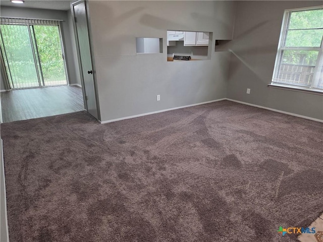 1805 Dickens Dr, Killeen, TX 76543 - carpeted empty room with baseboards