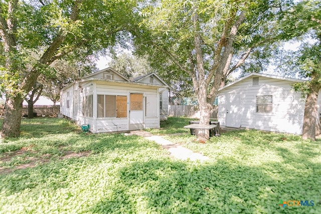 exterior space featuring a lawn