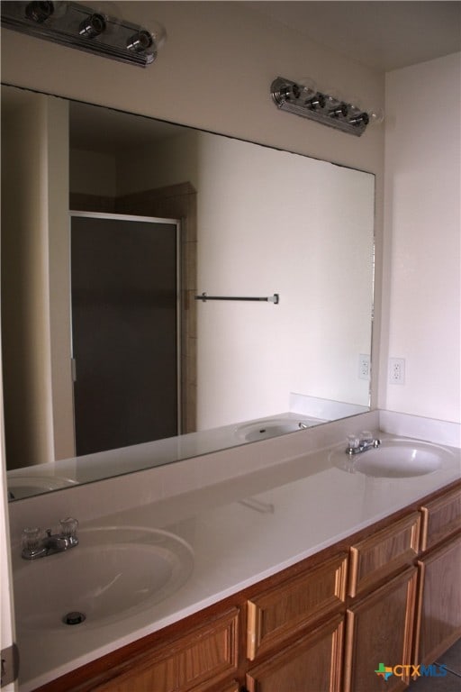 1402 Chips Dr, Killeen, TX 76549 - full bath featuring a shower stall and double vanity