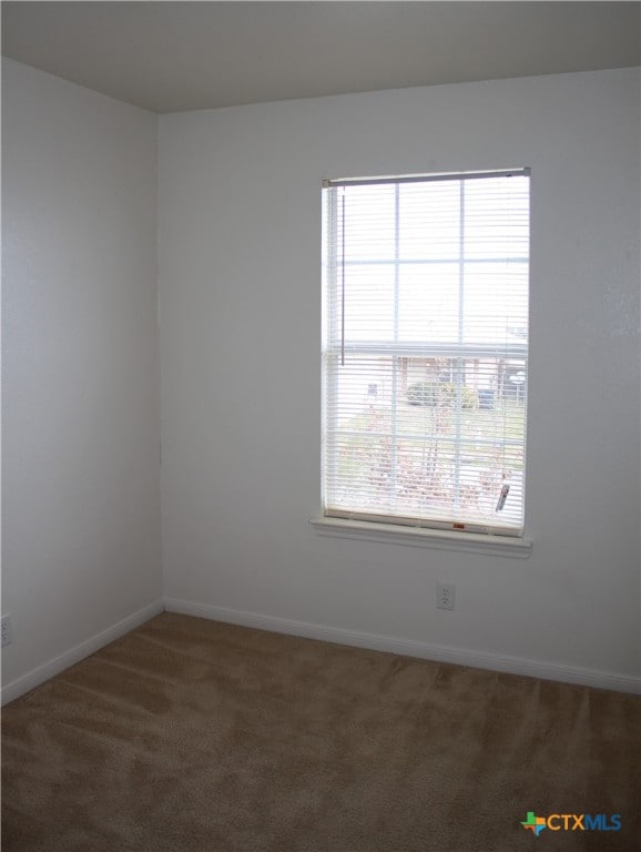 1402 Chips Dr, Killeen, TX 76549 - empty room featuring carpet flooring and baseboards