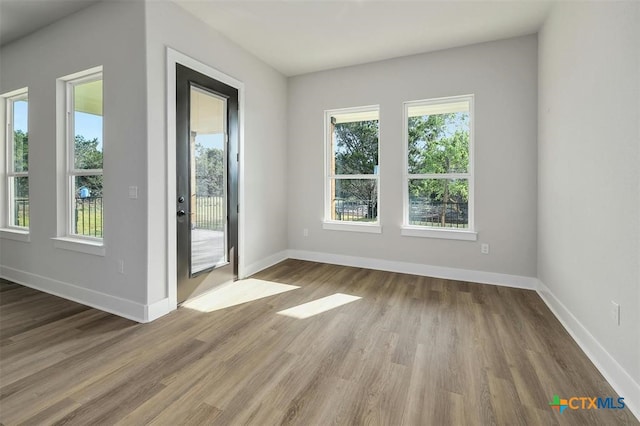 interior space with hardwood / wood-style floors