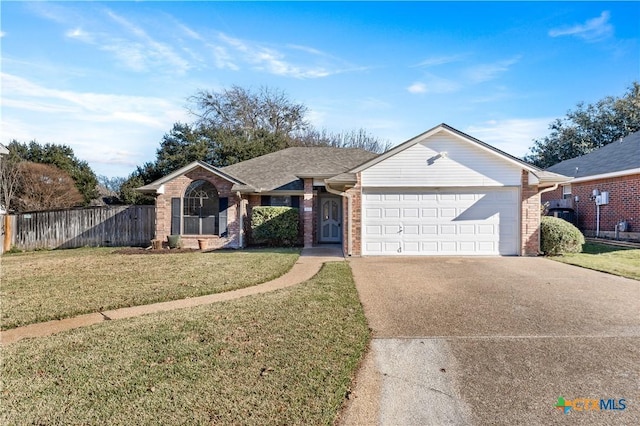 single story home with a garage and a front lawn